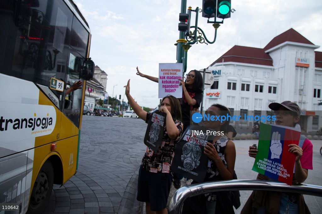 YOGYAKARTA, INDONESIA - OCTOBER 30, 2026: Members of the "Ibu Berisik" community staged a protest at the Zero Kilometer Marker in Yogyakarta, calling on the government to handle natural disasters with transparency and prioritize public safety, economic stability and basic needs. Protesters also demanded an end to division and guaranteed legal protection for citizens exercising freedom of expression. (Photo by Topen Anggara Saputra/JNA Press via Nexpher Images)
