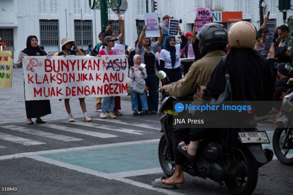 YOGYAKARTA, INDONESIA - OCTOBER 30, 2026: Members of the "Ibu Berisik" community staged a protest at the Zero Kilometer Marker in Yogyakarta, calling on the government to handle natural disasters with transparency and prioritize public safety, economic stability and basic needs. Protesters also demanded an end to division and guaranteed legal protection for citizens exercising freedom of expression. (Photo by Topen Anggara Saputra/JNA Press via Nexpher Images)