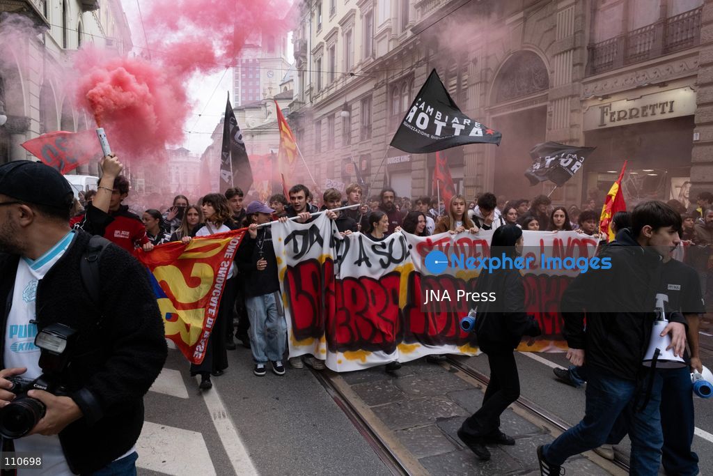 TURIN, ITALY - OCTOBER 30, 2026: Demonstrators march through the streets of Turin during a nationwide general strike called by the Unione Sindacale di Base (USB) trade union. Workers, students and activists protest against rising living costs, low wages, war and military spending, calling for better working conditions and greater investment in public services. (Photo by Ezgi Kose/JNA Press via Nexpher Images)