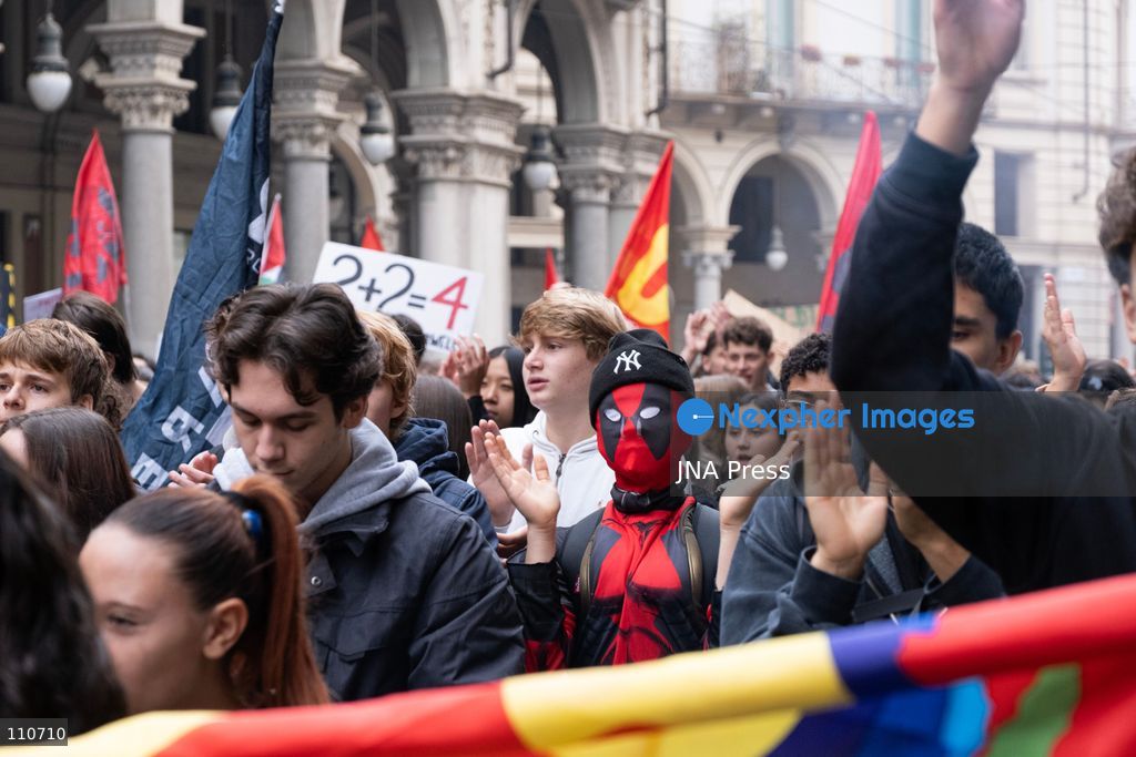 TURIN, ITALY - OCTOBER 30, 2026: Demonstrators march through the streets of Turin during a nationwide general strike called by the Unione Sindacale di Base (USB) trade union. Workers, students and activists protest against rising living costs, low wages, war and military spending, calling for better working conditions and greater investment in public services. (Photo by Ezgi Kose/JNA Press via Nexpher Images)
