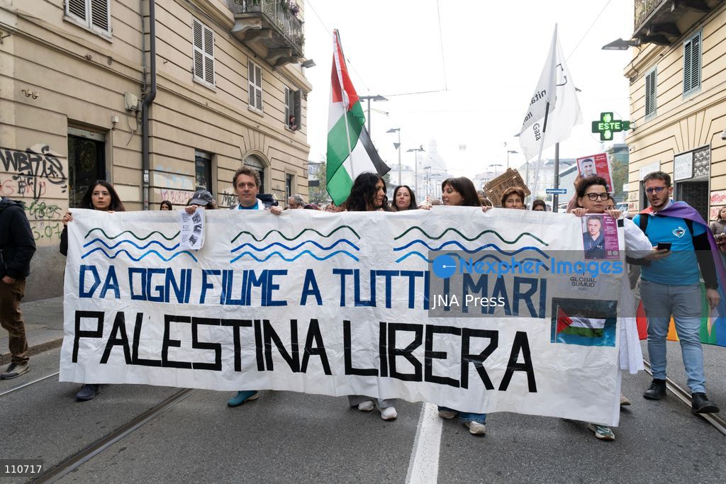 TURIN, ITALY - OCTOBER 30, 2026: Demonstrators march through the streets of Turin during a nationwide general strike called by the Unione Sindacale di Base (USB) trade union. Workers, students and activists protest against rising living costs, low wages, war and military spending, calling for better working conditions and greater investment in public services. (Photo by Ezgi Kose/JNA Press via Nexpher Images)
