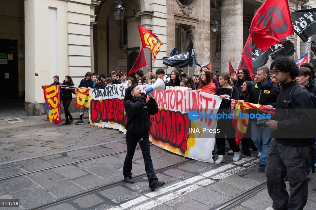 TURIN, ITALY - OCTOBER 30, 2026: Demonstrators march through the streets of Turin during a nationwide general strike called by the Unione Sindacale di Base (USB) trade union. Workers, students and activists protest against rising living costs, low wages, war and military spending, calling for better working conditions and greater investment in public services. (Photo by Ezgi Kose/JNA Press via Nexpher Images)