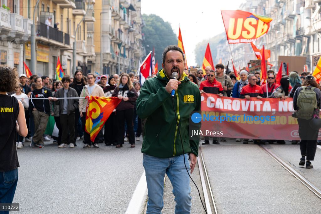 TURIN, ITALY - OCTOBER 30, 2026: Demonstrators march through the streets of Turin during a nationwide general strike called by the Unione Sindacale di Base (USB) trade union. Workers, students and activists protest against rising living costs, low wages, war and military spending, calling for better working conditions and greater investment in public services. (Photo by Ezgi Kose/JNA Press via Nexpher Images)