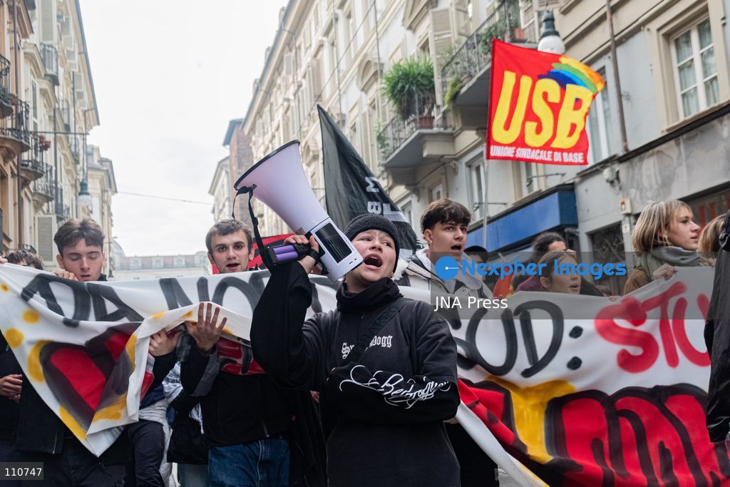 TURIN, ITALY - OCTOBER 30, 2026: Demonstrators marched through Turin during a general strike organized by the USB (Unione Sindacale di Base) trade union, protesting high living costs, low wages and poor school building conditions. A student contingent split off at Piazza Castello, where clashes with police resulted in three arrests. (Photo by Camilla Baronetto/JNA Press via Nexpher Images)