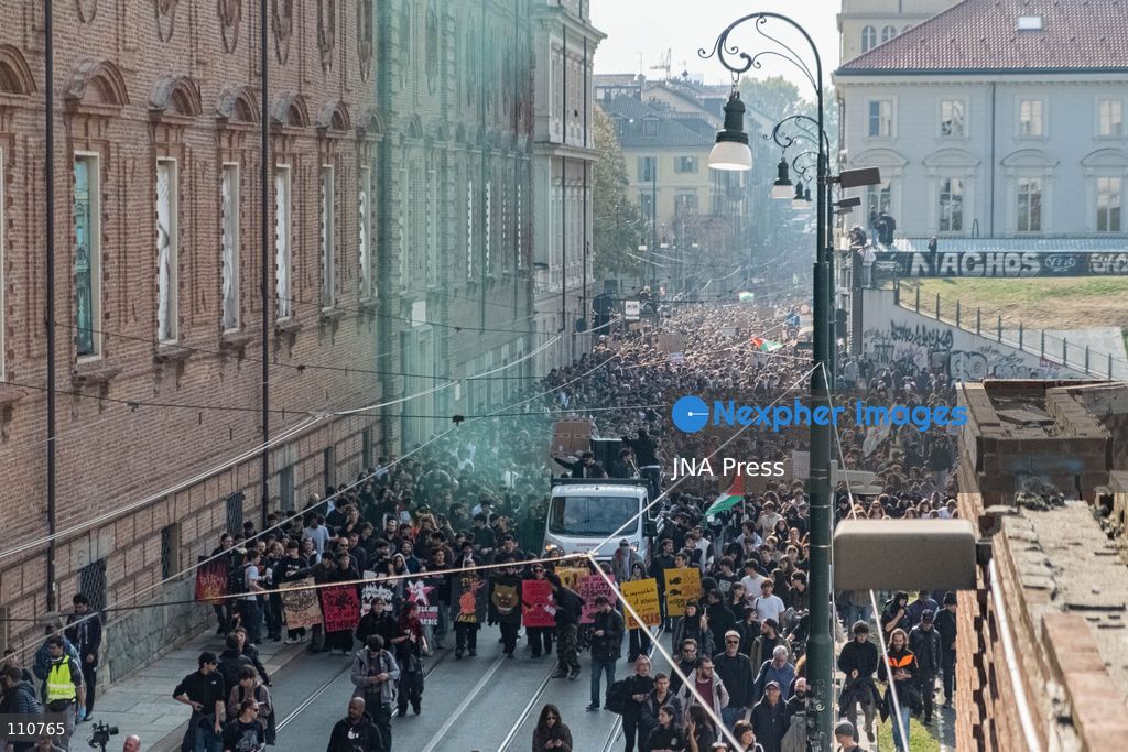 TURIN, ITALY - OCTOBER 30, 2026: Demonstrators marched through Turin during a general strike organized by the USB (Unione Sindacale di Base) trade union, protesting high living costs, low wages and poor school building conditions. A student contingent split off at Piazza Castello, where clashes with police resulted in three arrests. (Photo by Camilla Baronetto/JNA Press via Nexpher Images)