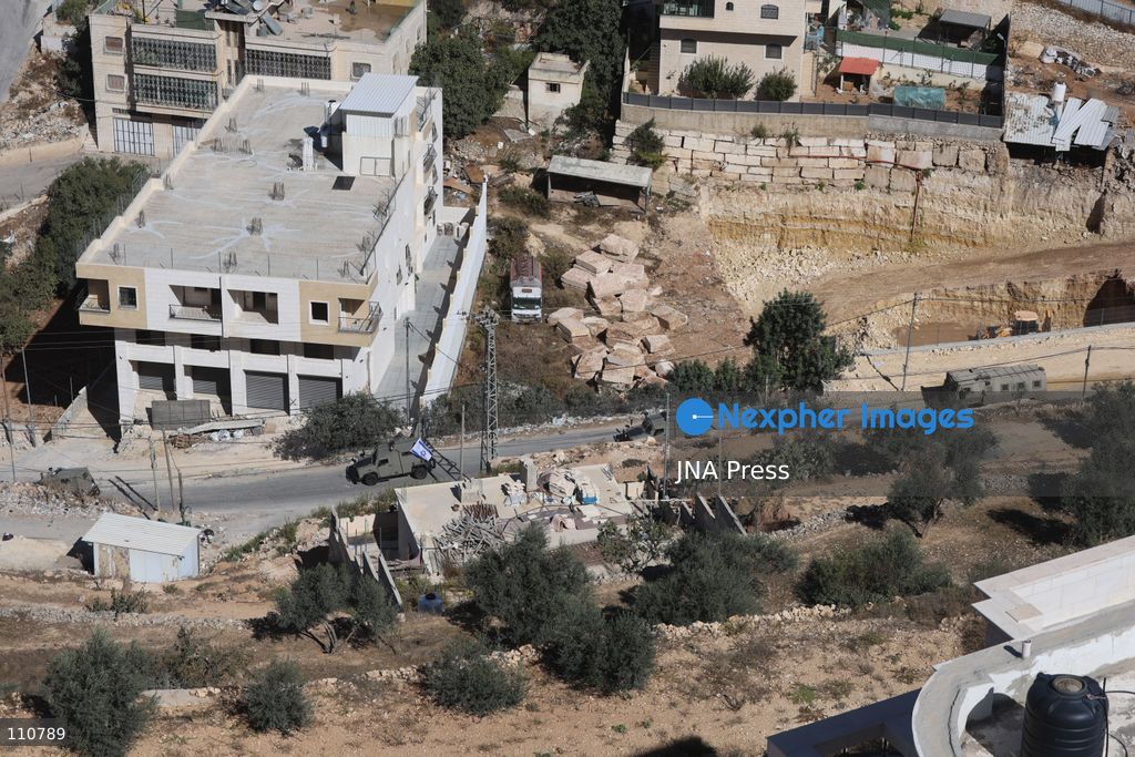HEBRON, PALESTINE, OCTOBER 30, 2026: Israeli forces demolish the family homes of Ahmad and Hamouda al-Jaaba in Hebron, in the occupied West Bank. The two Palestinians are accused of carrying out an October 23 shooting attack near the Farsh al-Hawa entrance to the city that killed two Israeli soldiers and wounded others. (Photo by Mosab shawer/JNA Press via Nexpher Images)