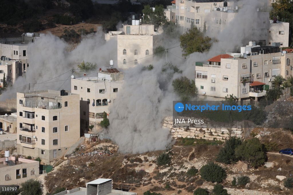 HEBRON, PALESTINE, OCTOBER 30, 2026: Israeli forces demolish the family homes of Ahmad and Hamouda al-Jaaba in Hebron, in the occupied West Bank. The two Palestinians are accused of carrying out an October 23 shooting attack near the Farsh al-Hawa entrance to the city that killed two Israeli soldiers and wounded others. (Photo by Mosab shawer/JNA Press via Nexpher Images)