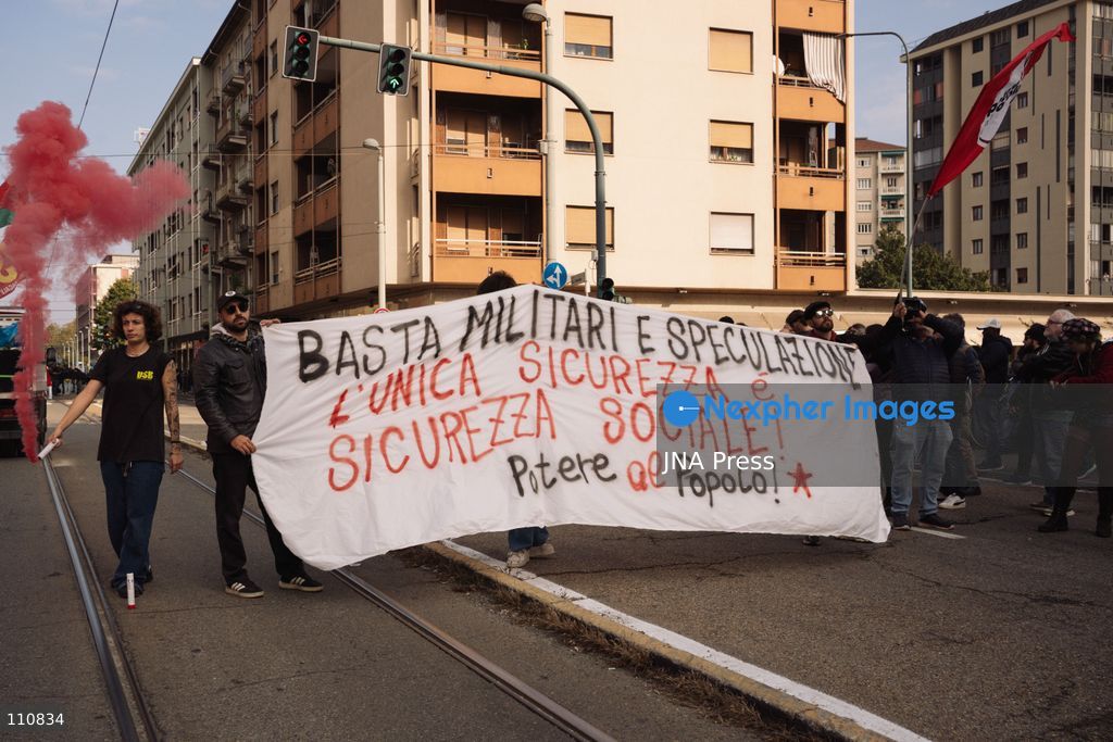 TURIN, ITALY, OCTOBER 30, 2026: Workers and demonstrators march through Turin during a nationwide general strike called by the Unione Sindacale di Base (USB) trade union. Protesters oppose war and rising living costs and demand protection for jobs and the right to strike. (Photo by Chiara Buldrini/JNA Press via Nexpher Images)