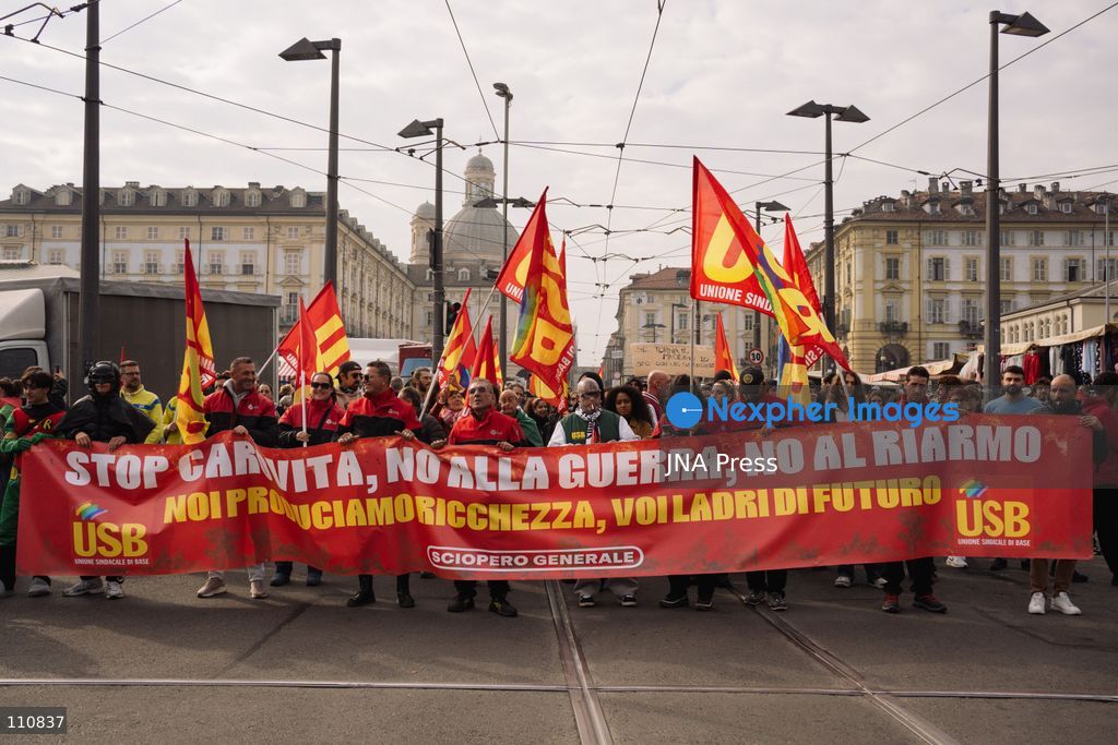 TURIN, ITALY, OCTOBER 30, 2026: Workers and demonstrators march through Turin during a nationwide general strike called by the Unione Sindacale di Base (USB) trade union. Protesters oppose war and rising living costs and demand protection for jobs and the right to strike. (Photo by Chiara Buldrini/JNA Press via Nexpher Images)