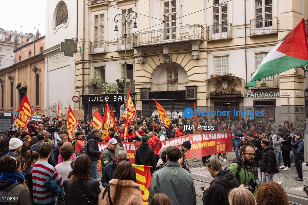 TURIN, ITALY, OCTOBER 30, 2026: Workers and demonstrators march through Turin during a nationwide general strike called by the Unione Sindacale di Base (USB) trade union. Protesters oppose war and rising living costs and demand protection for jobs and the right to strike. (Photo by Chiara Buldrini/JNA Press via Nexpher Images)