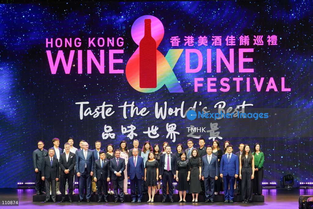 Hong Kong Secretary for Culture, Sports and Tourism Rosanna Law, Hong Kong Tourism Board Chairman Peter Lam and other guests pose for photographs during the opening ceremony of the Hong Kong Wine & Dine Festival 2026 at the Central Harbourfront Event Space in Hong Kong on October 29, 2026. (Photo by Zulu Lo/TMHK via Nexpher Images)