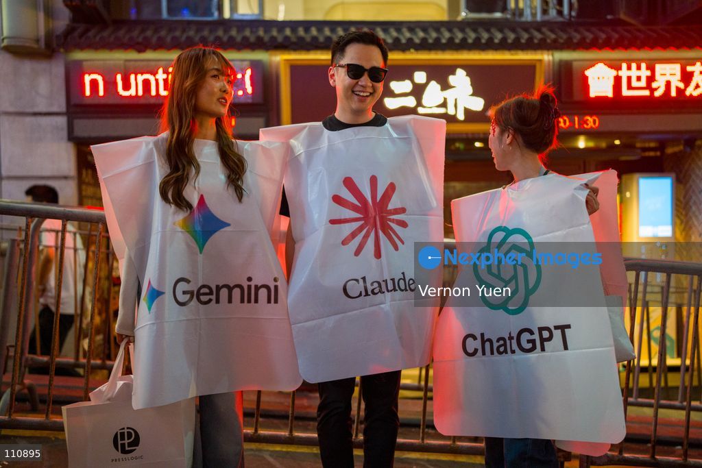 People wearing costumes with logos of popular AI LLM chatbot models, ChatGPT, Claude and Gemini on October 30, 2026 in Hong Kong. (Photo by Vernon Yuen/Nexpher Images)