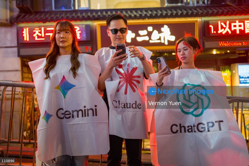 People wearing costumes with logos of popular AI LLM chatbot models, ChatGPT, Claude and Gemini on October 30, 2026 in Hong Kong. (Photo by Vernon Yuen/Nexpher Images)