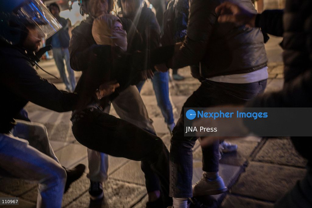 TURIN, ITALY - OCTOBER 30, 2026: Demonstrators march through central Turin during a protest that began at Piazza Castello at 6:00 p.m against rearmament. Clashes occurred on Via Roma where police officers used force against demonstrators. (Photo by Giulia Gorla/JNA Press via Nexpher Images)