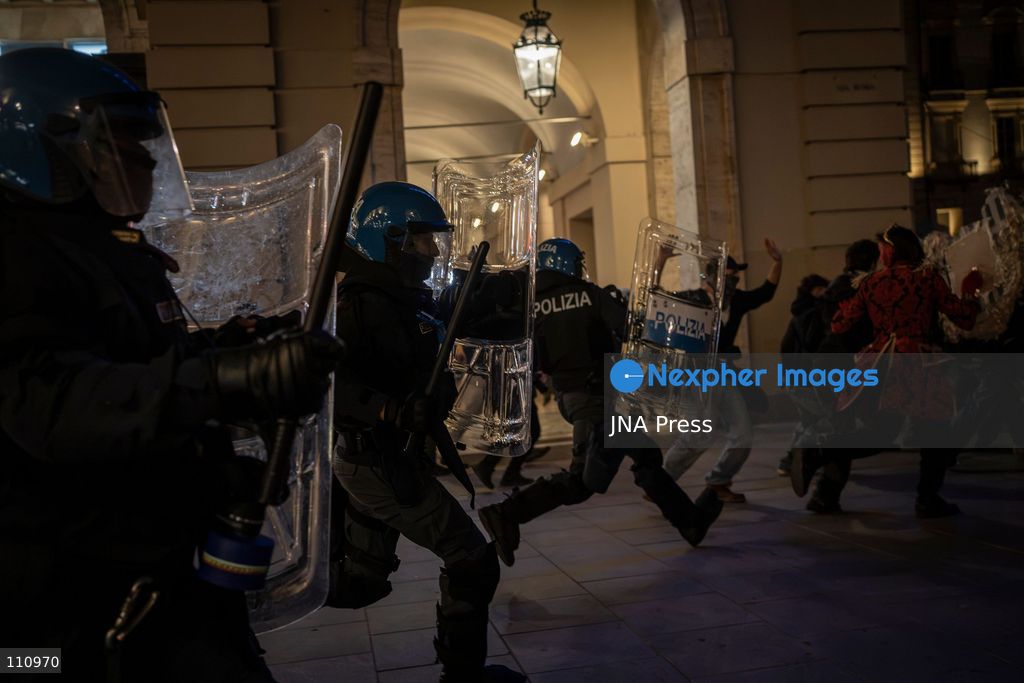 TURIN, ITALY - OCTOBER 30, 2026: Demonstrators march through central Turin during a protest that began at Piazza Castello at 6:00 p.m against rearmament. Clashes occurred on Via Roma where police officers used force against demonstrators. (Photo by Giulia Gorla/JNA Press via Nexpher Images)