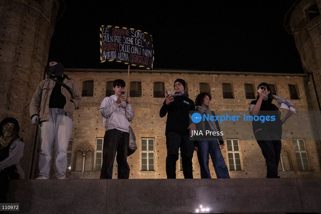 TURIN, ITALY - OCTOBER 30, 2026: Demonstrators march through central Turin during a protest that began at Piazza Castello at 6:00 p.m against rearmament. Clashes occurred on Via Roma where police officers used force against demonstrators. (Photo by Giulia Gorla/JNA Press via Nexpher Images)