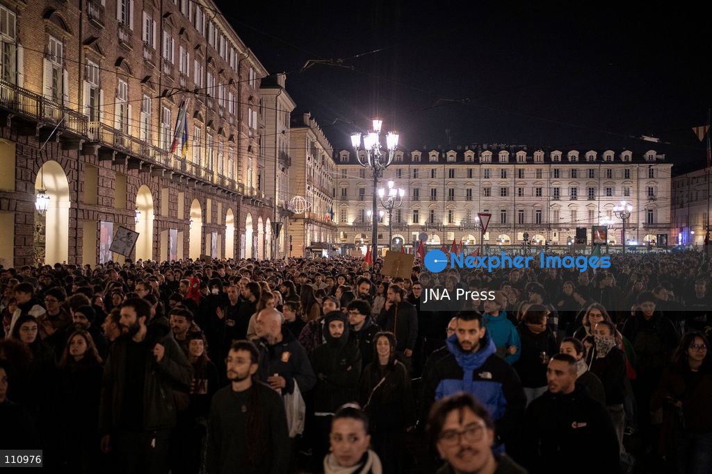 TURIN, ITALY - OCTOBER 30, 2026: Demonstrators march through central Turin during a protest that began at Piazza Castello at 6:00 p.m against rearmament. Clashes occurred on Via Roma where police officers used force against demonstrators. (Photo by Giulia Gorla/JNA Press via Nexpher Images)