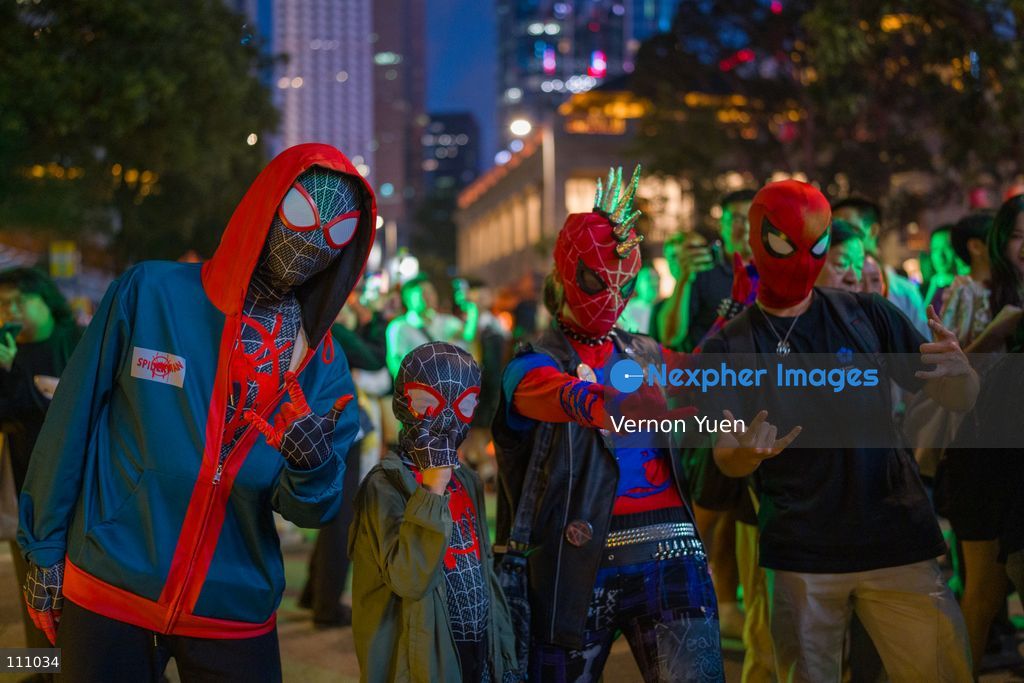 People dress in costumes at a Halloween market in Central District on October 31, 2026 in Hong Kong. (Photo by Vernon Yuen/Nexpher Images)