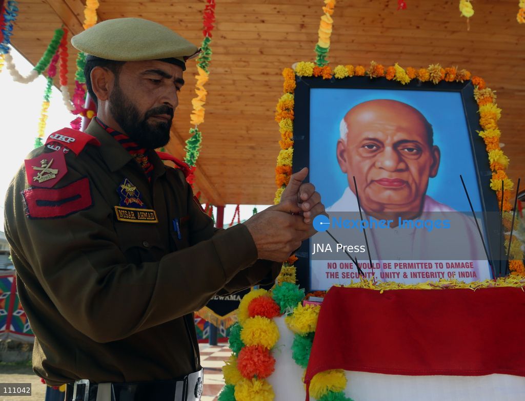 PULWAMA, INDIA - OCTOBER 31, 2026: A security officer pays tribute to Sardar Vallabhbhai Patel, widely known as the 'Iron Man of India', on his 151st birth anniversary. The day is observed as Rashtriya Ekta Diwas (National Unity Day) to honour Patel, India's first Deputy Prime Minister and Home Minister, for his role in unifying the country. (Photo by Nisar Ul Haq Haq/JNA Press via Nexpher Images)
