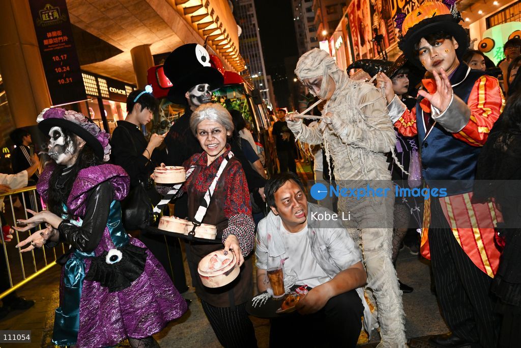 Cosplayers posing photo during Halloween day at Mong Kok on October 31, 2026 in Hong Kong. (Photo by Kobe Li/Nexpher Images)