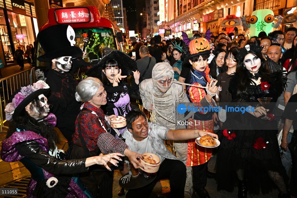 Cosplayers posing photo during Halloween day at Mong Kok on October 31, 2026 in Hong Kong. (Photo by Kobe Li/Nexpher Images)