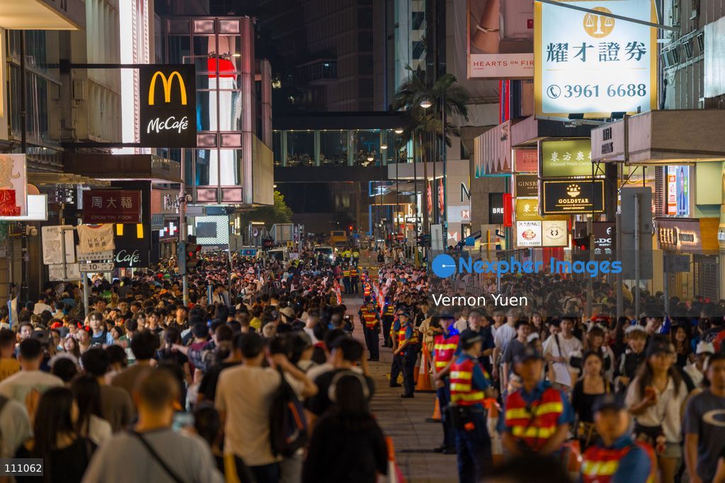 People lining to get into Lan Kwai Fong, a popular bar district in Central District on October 31, 2026 in Hong Kong. (Photo by Vernon Yuen/Nexpher Images)