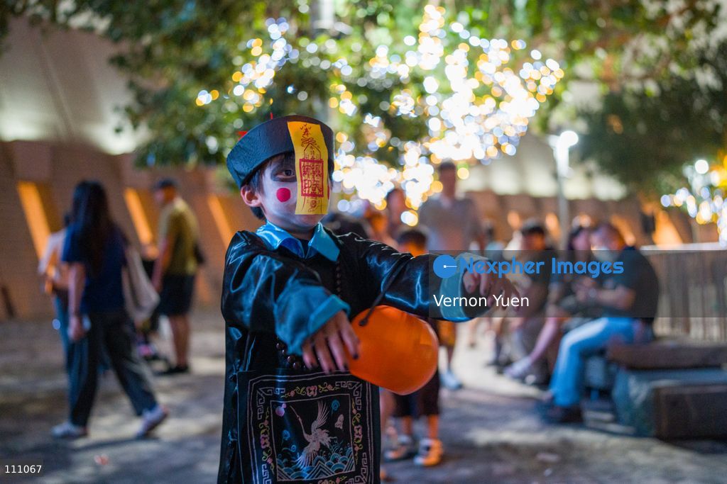 A child dress as a Chinese ghost on October 31, 2026 in Hong Kong. (Photo by Vernon Yuen/Nexpher Images)
