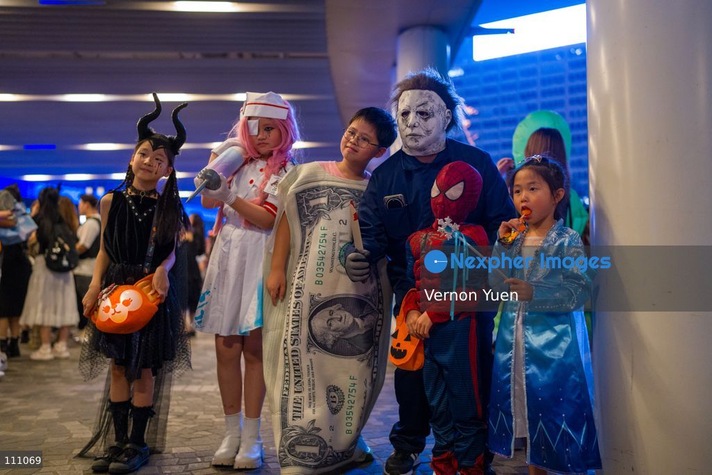 People in halloween costumes on October 31, 2026 in Hong Kong. (Photo by Vernon Yuen/Nexpher Images)