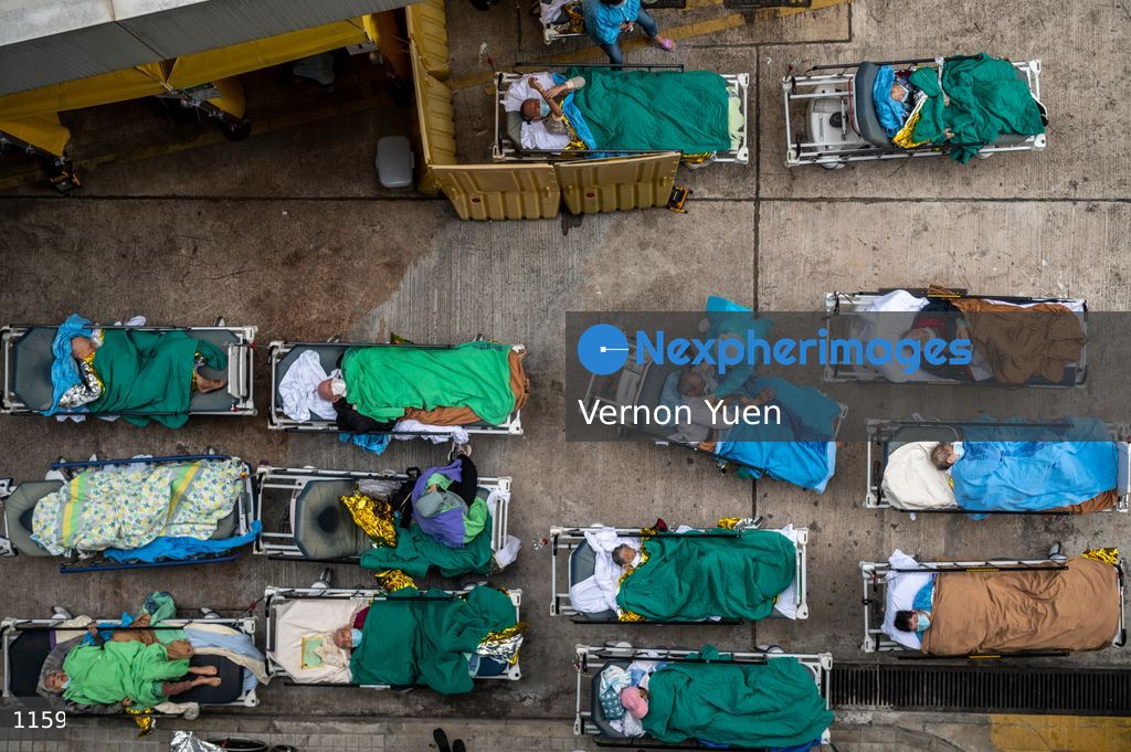 Hong Kong Hospital Overrun with Patients admit Covid-19 Outbreak
