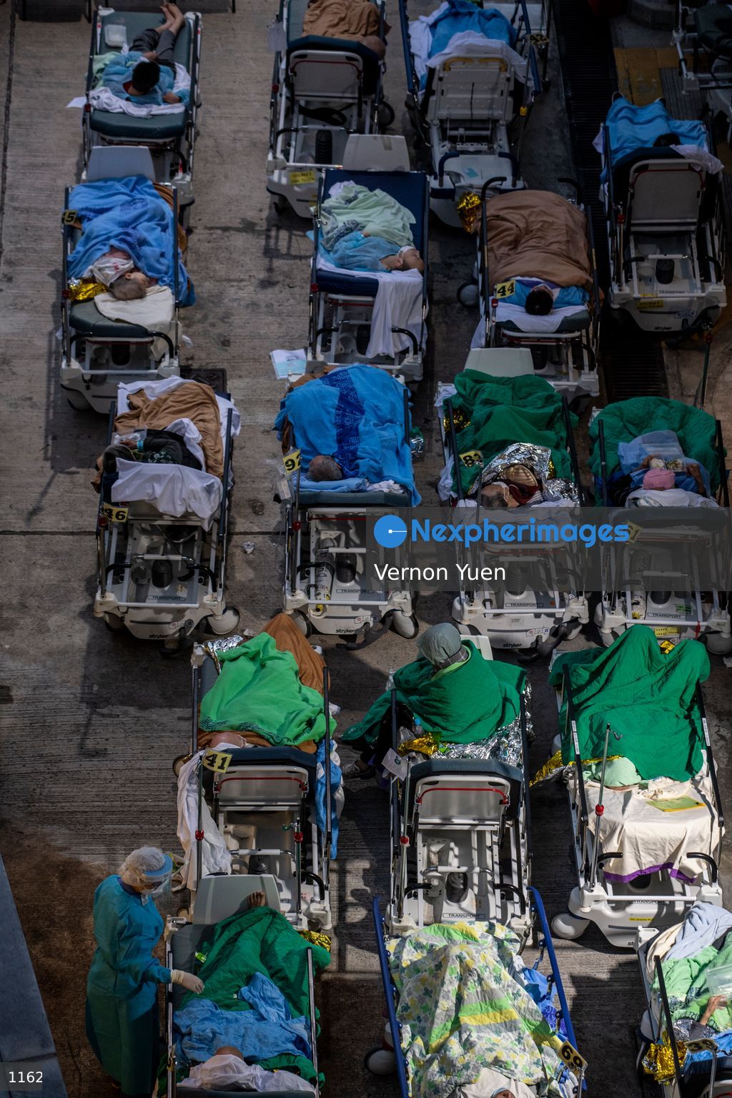 Hong Kong Hospital Overrun with Patients admit Covid-19 Outbreak
