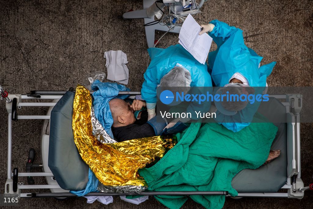 Hong Kong Hospital Overrun with Patients admit Covid-19 Outbreak