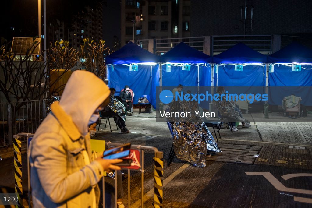 Hong Kong Hospital Overrun with Patients admit Covid-19 Outbreak