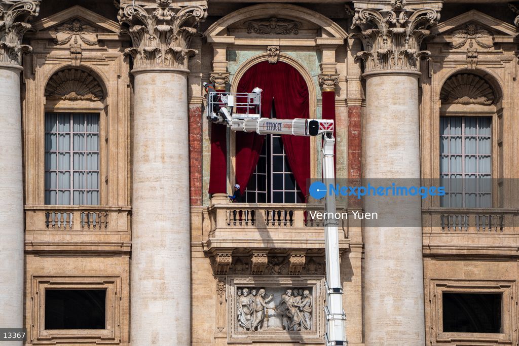 Vatican installs Red Curtains on Balcony of St Peter's Basilica