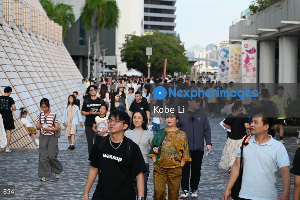 Chinese tourists travel to Hong Kong during national day holiday