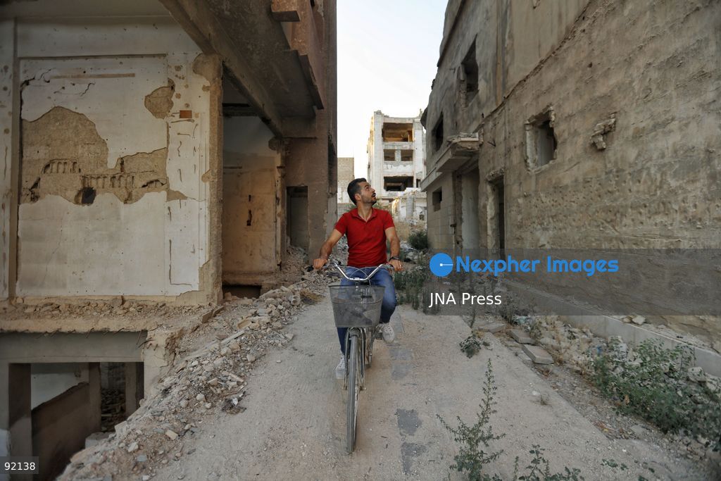 DAMASCUS, SYRIA, SEPTEMBER 14, 2026: Ahmet returns to the neighborhood where he grew up after spending 15 years in Turkey, having left Syria following the outbreak of conflict. On returning, he found much of his former neighborhood abandoned and heavily damaged. His journey reflects the experiences of Syrians returning to communities they left during years of conflict. Photo by Berke Arakli/ JNA Press. (Photo by Berke Araklı/JNA Press via Nexpher Images)