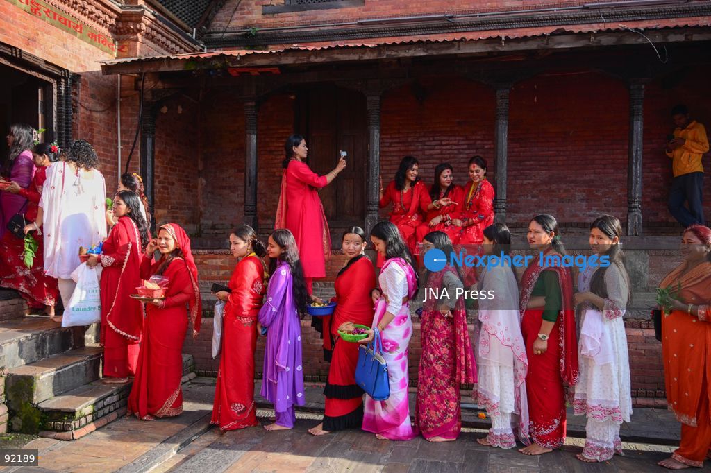 KATHMANDU, NEPAL, SEPTEMBER 14, 2026: Hindu women devotees dressed in traditional red attire gather at Pashupatinath Temple in Kathmandu to celebrate Hartalika Teej. Women offer prayers and perform religious rituals dedicated to Lord Shiva and Goddess Parvati, with many observing a traditional fast and gathering for worship, devotional singing and dancing during the festival. Photo by Safal Prakash Shrestha / JNA Press. (Photo by Safal Prakash Shrestha/JNA Press via Nexpher Images)