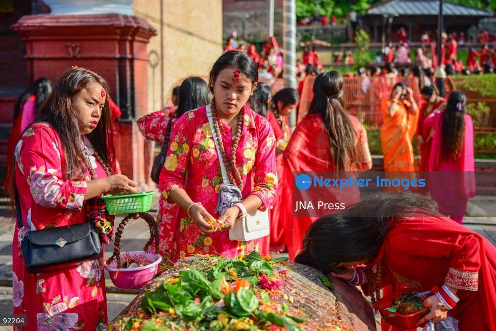 KATHMANDU, NEPAL, SEPTEMBER 14, 2026: Hindu women devotees dressed in traditional red attire gather at Pashupatinath Temple in Kathmandu to celebrate Hartalika Teej. Women offer prayers and perform religious rituals dedicated to Lord Shiva and Goddess Parvati, with many observing a traditional fast and gathering for worship, devotional singing and dancing during the festival. Photo by Safal Prakash Shrestha / JNA Press. (Photo by Safal Prakash Shrestha/JNA Press via Nexpher Images)
