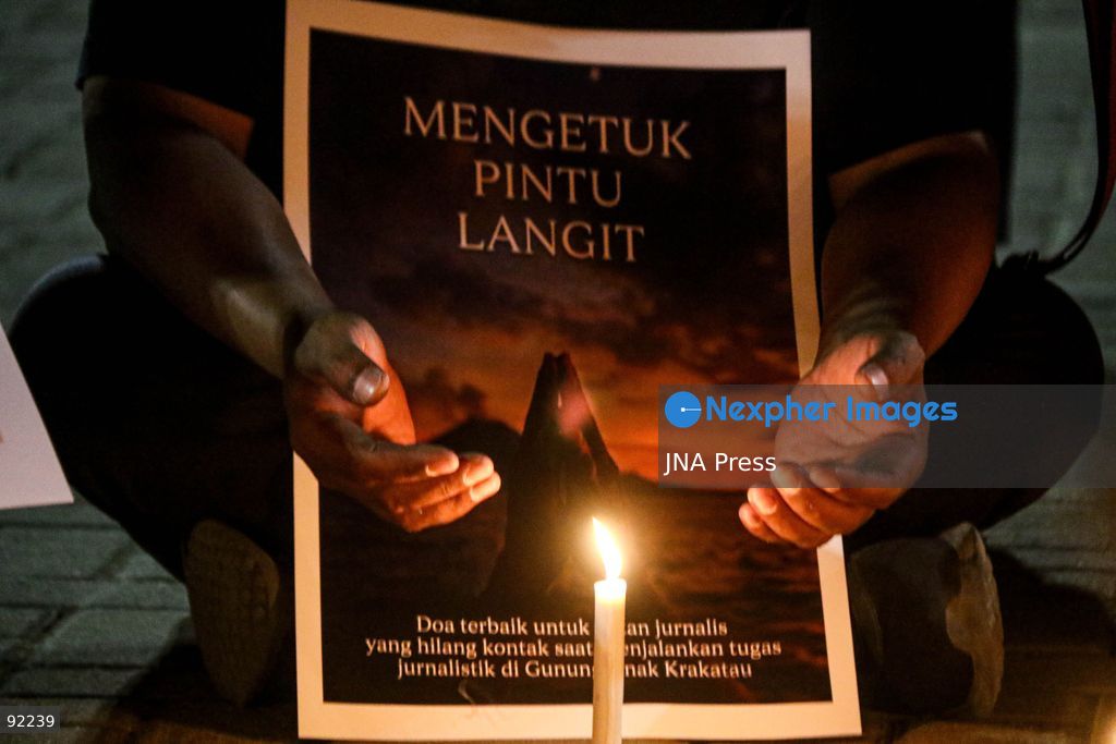 SURAKARTA, CENTRAL JAVA, INDONESIA, SEPTEMBER 14, 2026: Journalists and media workers take part in a solidarity prayer at Solo City Hall for five journalists, two crew members and a guide who lost contact while covering the eruption of Mount Anak Krakatau in the Sunda Strait. The event was organized by the Solo branches of the Indonesian Photojournalists Association (PFI), Indonesian Journalists Association (PWI) and Alliance of Independent Journalists (AJI), together with journalists from various media organizations, in support of ongoing search efforts. Photo by Ilham Nur Arifin / JNA Press. (Photo by Ilham Nur Arifin/JNA Press via Nexpher Images)