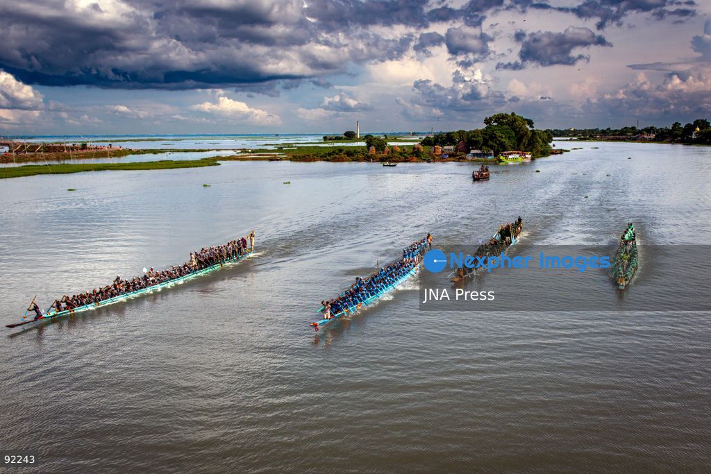 BRAHMANBARIA, BANGLADESH, SEPTEMBER 12, 2026: Rowers compete during a traditional boat race on the Titas River in Brahmanbaria as spectators gather along the riverbanks to watch the event. Traditional boat racing remains a popular cultural event in Bangladesh’s river communities, bringing together teams and spectators for competitions held on the country’s waterways. Photo by Anisur Rahman / JNA Press. (Photo by Anisur Rahman/JNA Press via Nexpher Images)