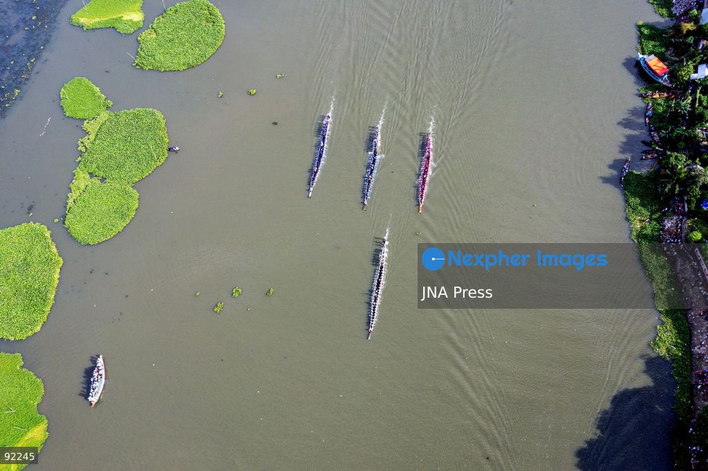 BRAHMANBARIA, BANGLADESH, SEPTEMBER 12, 2026: Rowers compete during a traditional boat race on the Titas River in Brahmanbaria as spectators gather along the riverbanks to watch the event. Traditional boat racing remains a popular cultural event in Bangladesh’s river communities, bringing together teams and spectators for competitions held on the country’s waterways. Photo by Anisur Rahman / JNA Press. (Photo by Anisur Rahman/JNA Press via Nexpher Images)