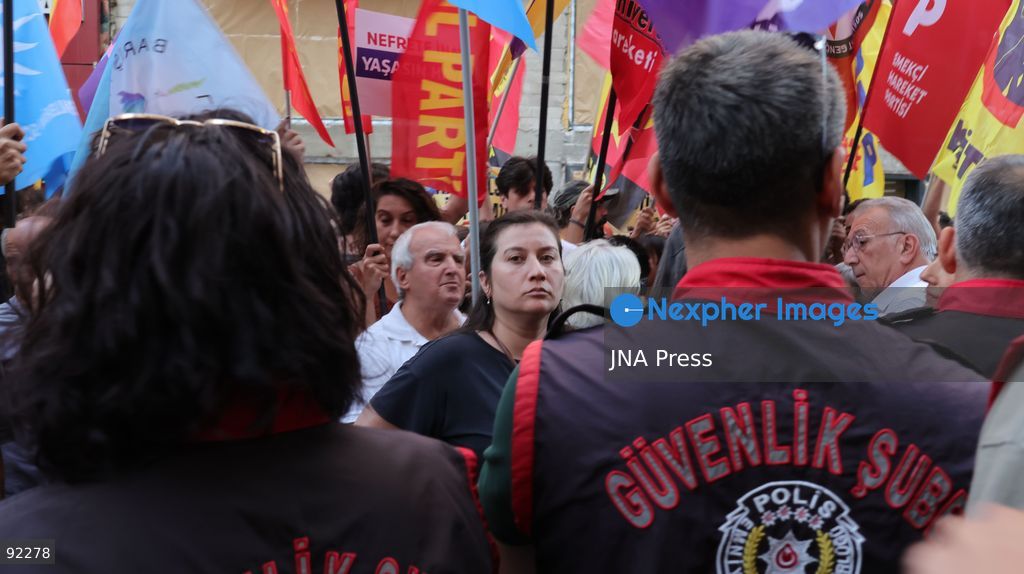 IZMIR, TURKEY, SEPTEMBER 14, 2026: Police intervene as demonstrators gather on Cyprus Martyrs Street in the Alsancak district of Izmir during a Feminist Night March in solidarity with LGBTI+ people. A scuffle broke out after police prevented demonstrators from unfurling a banner bearing the words “LGBTI+,” with officers using pepper spray to disperse the crowd. Two people were detained and several participants sustained minor injuries during the intervention, according to information provided by the photographer. Photo by Turgay Kilic / JNA Press. (Photo by Turgay Kilic/JNA Press via Nexpher Images)