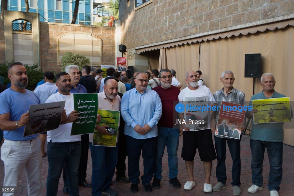 BEIRUT, LEBANON - Sept. 15: Men stand together at a protest on Sept. 15, 2026 in Beirut's southern suburbs over Israel's continued destruction of villages in south Lebanon. Photo by Nicholas Frakes / JNA Press (Photo by Nicholas Frakes/JNA Press via Nexpher Images)