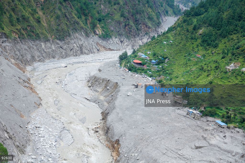 DEVIGHAT, NUWAKOT, NEPAL, SEPTEMBER 15, 2026: Aerial views show damage to homes and surrounding areas in Devighat, Nuwakot, following recent floods and landslides. Sand, rocks and debris cover parts of the settlement where homes and other structures were damaged or destroyed by floodwaters and landslides. Photo by Gopal Dahal/ JNA Press. (Photo by Gopal Dahal/JNA Press via Nexpher Images)
