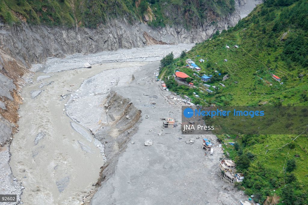 DEVIGHAT, NUWAKOT, NEPAL, SEPTEMBER 15, 2026: Aerial views show damage to homes and surrounding areas in Devighat, Nuwakot, following recent floods and landslides. Sand, rocks and debris cover parts of the settlement where homes and other structures were damaged or destroyed by floodwaters and landslides. Photo by Gopal Dahal/ JNA Press. (Photo by Gopal Dahal/JNA Press via Nexpher Images)