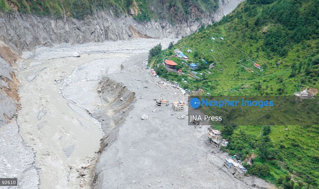 DEVIGHAT, NUWAKOT, NEPAL, SEPTEMBER 15, 2026: Aerial views show damage to homes and surrounding areas in Devighat, Nuwakot, following recent floods and landslides. Sand, rocks and debris cover parts of the settlement where homes and other structures were damaged or destroyed by floodwaters and landslides. Photo by Gopal Dahal/ JNA Press. (Photo by Gopal Dahal/JNA Press via Nexpher Images)