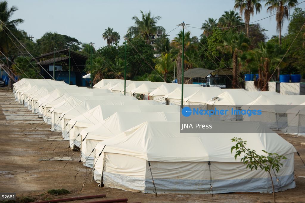 LA GUAIRA, VENEZUELA, SEPTEMBER 12, 2026: Residents displaced by earthquakes remain in transitional camps in La Guaira more than two months after the disaster. The facilities provide basic services including restrooms, showers, laundry areas and internet access, while some residents have established small stalls selling food and other goods as daily and commercial activity develops within the temporary settlements. Photo by Franyer Nieves/ JNA Press. (Photo by Franyer Nieves (Babel)/JNA Press via Nexpher Images)