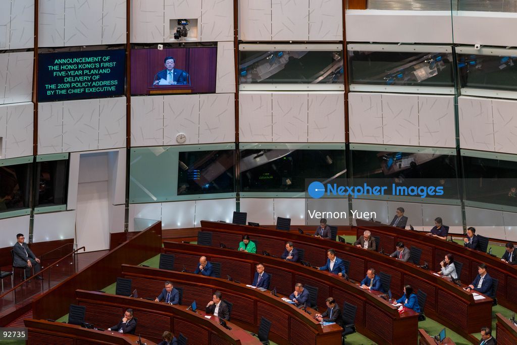 A screen showing Hong Kong Chief Executive John Lee speaking at the legislative council as he delivers his 2026 policy address and the first Hong Mong Five Year plan on September 16, 2026 in Hong Kong. Hong Kong today released its First five year plan along side with the Chief Executive’s 2026 Policy Address. (Photo by Vernon Yuen/Nexpher Images)