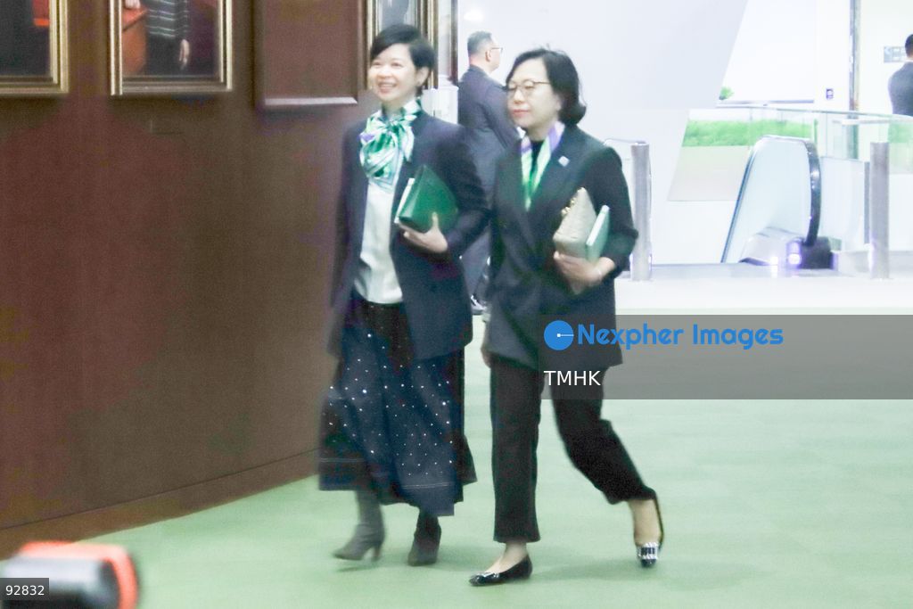 Secretary for Housing Winnie Ho Wing-yin and Secretary for Home and Youth Affairs Alice Mak Mei-kuen arrive at the Legislative Council chamber to attend the Chief Executive's 2026 Policy Address on September 16, 2026 in Hong Kong. (Photo by Gordon Choi/TMHK via Nexpher Images)