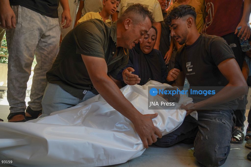 KHAN YOUNIS, GAZA STRIP, PALESTINE, SEPTEMBER 16, 2026: Relatives mourn and bid farewell to eight-year-old Amal Al-Mughayyir, who was reported killed in an Israeli strike the previous night in the Al-Mawasi area of Khan Younis, southern Gaza Strip. Photo by Ramzi Abu Amer / JNA Press. (Photo by Ramzi Abu Amer/JNA Press via Nexpher Images)