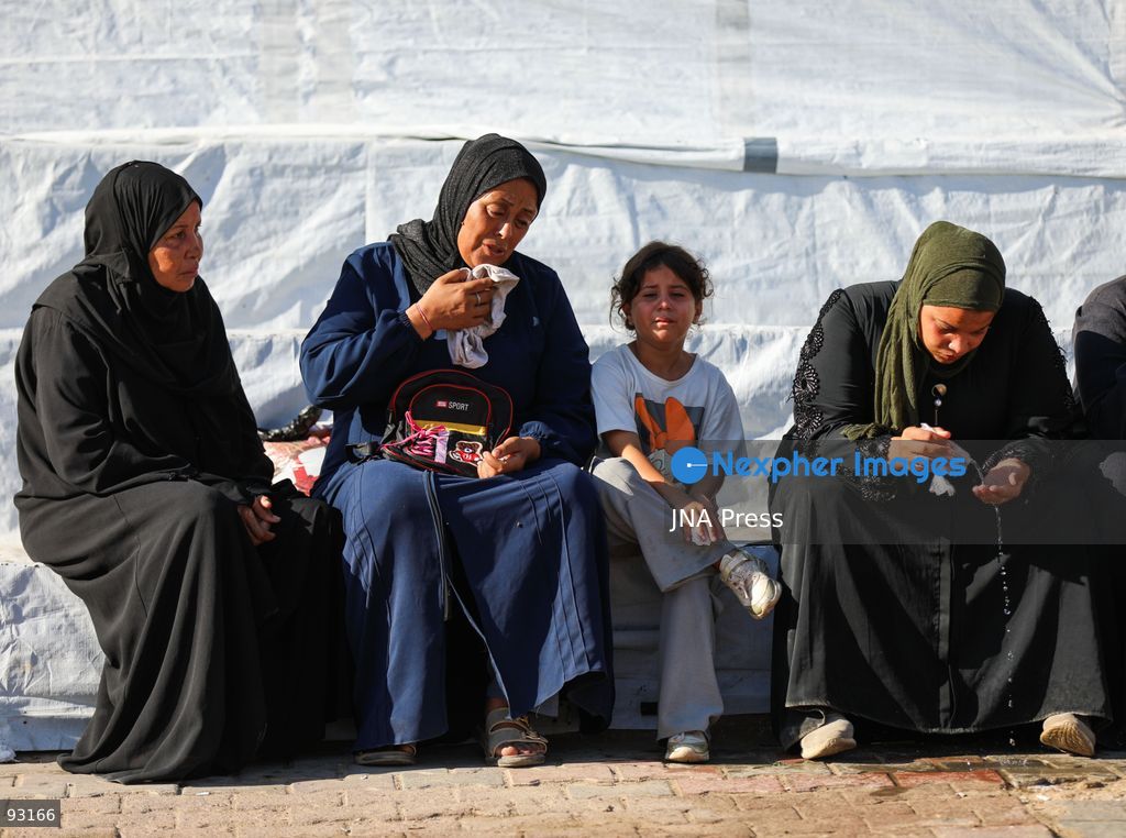 KHAN YOUNIS, GAZA STRIP, PALESTINE, SEPTEMBER 16, 2026: Relatives mourn and bid farewell to eight-year-old Amal Al-Mughayyir, who was reported killed in an Israeli strike the previous night in the Al-Mawasi area of Khan Younis, southern Gaza Strip. Photo by Ramzi Abu Amer / JNA Press. (Photo by Ramzi Abu Amer/JNA Press via Nexpher Images)